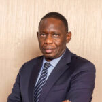 Dr. Michael Atingi-Ego
